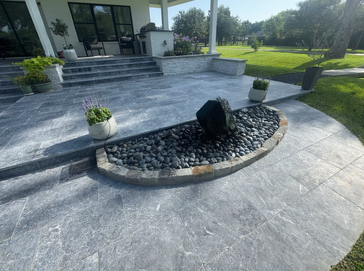 Acid stained concrete patio amber tones — Ford Concrete design idea