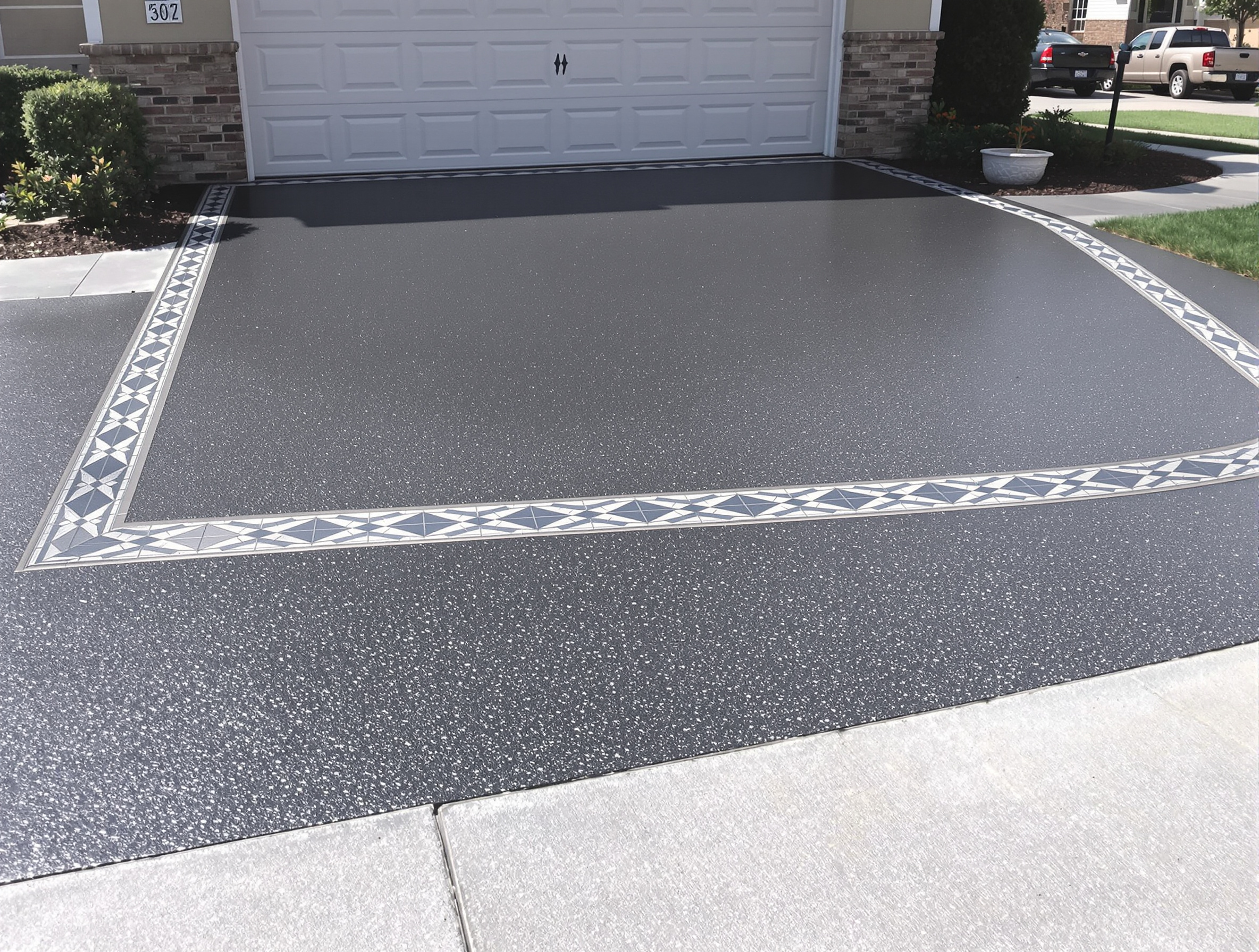 Colored concrete driveway apron decorative — Ford Concrete design idea