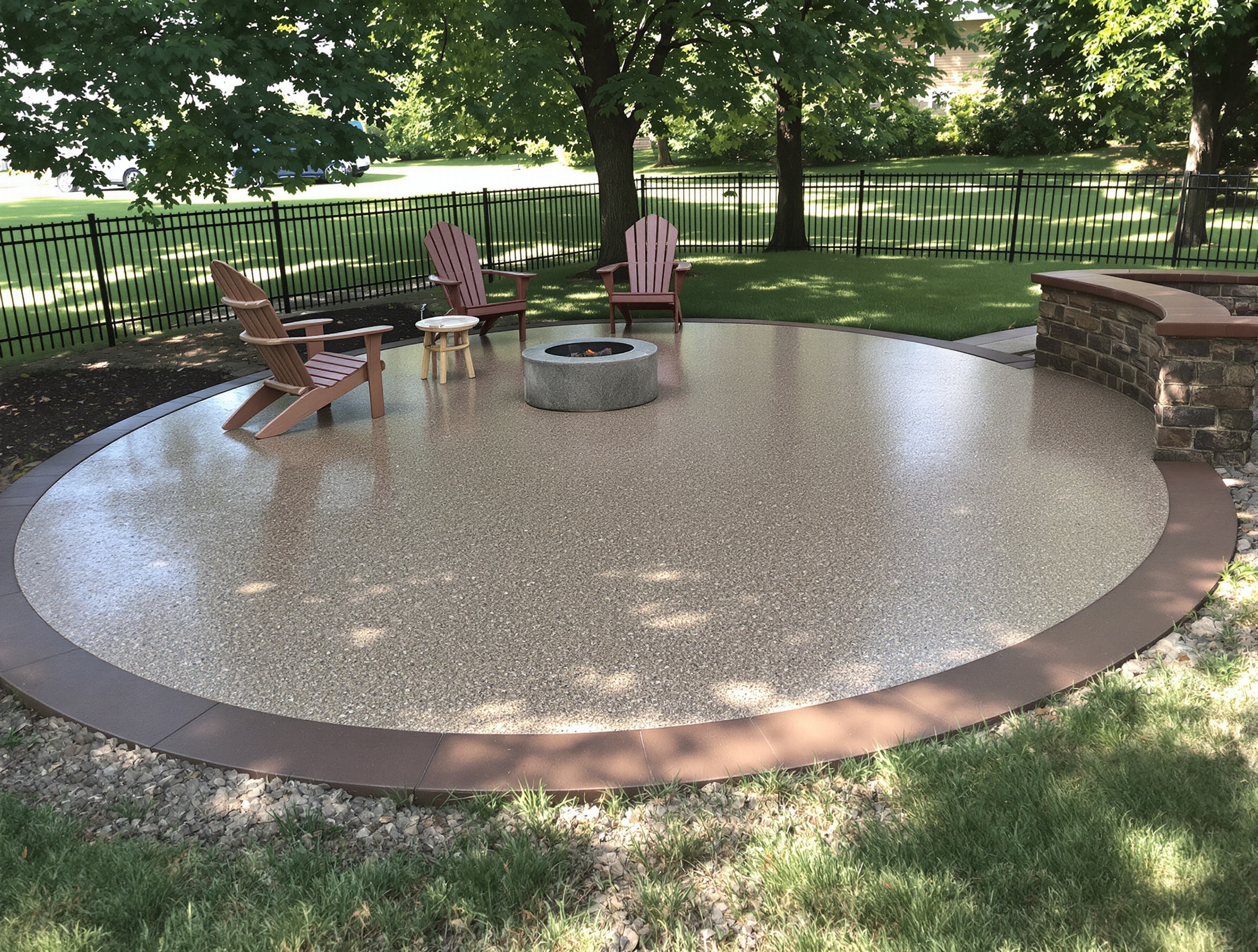Exposed aggregate patio with smooth border — Ford Concrete design idea