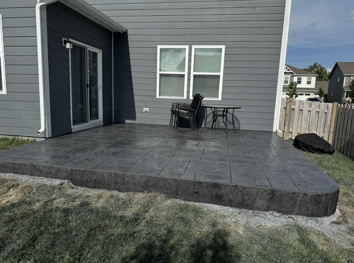 Stamped concrete patio seamless slate charcoal grey — Ford Concrete design idea