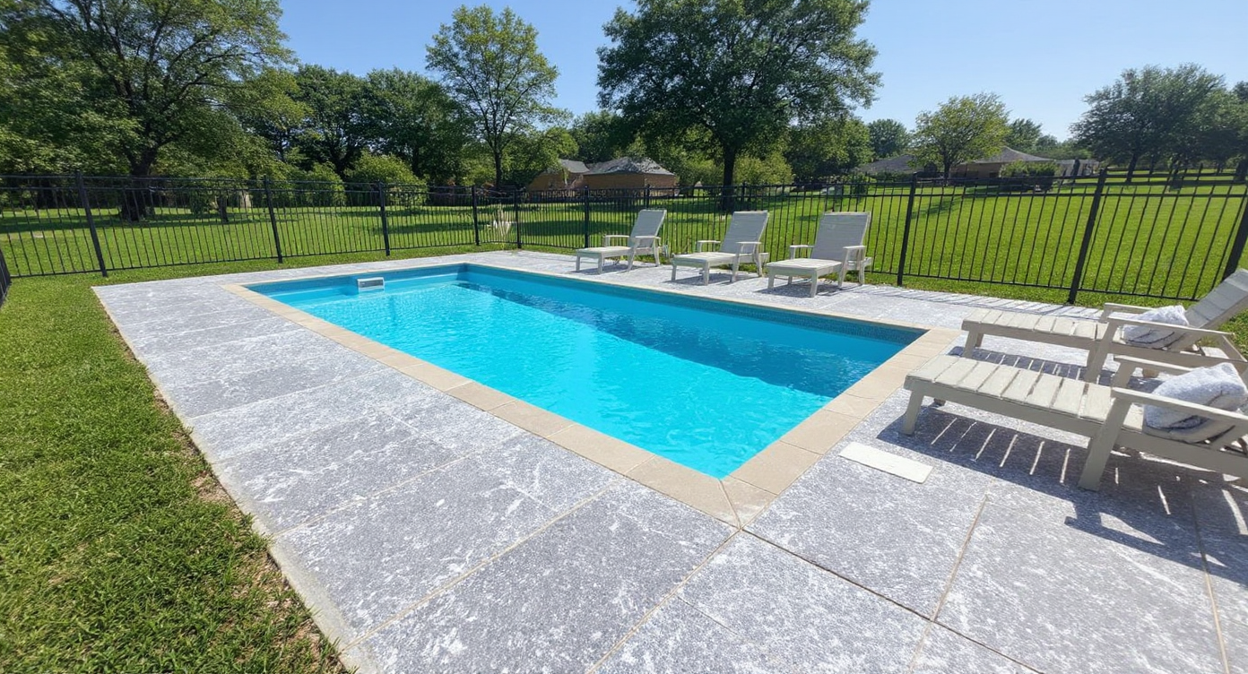 Colored concrete pool deck with blue water — Kansas City
