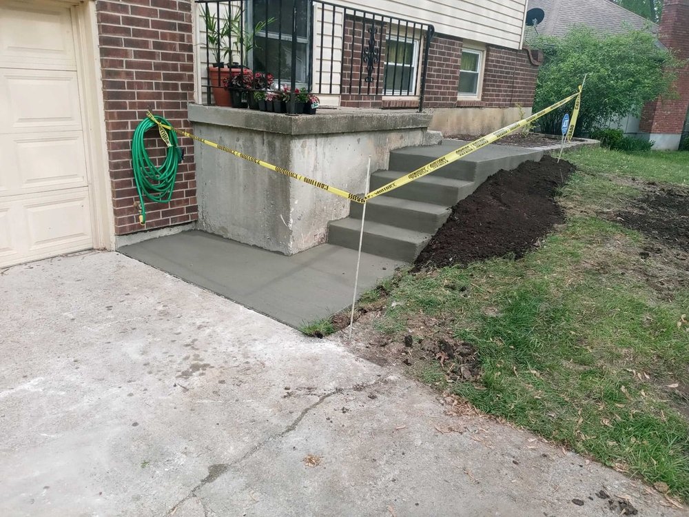 Concrete step replacement Kansas City — brick house entry | Ford Concrete