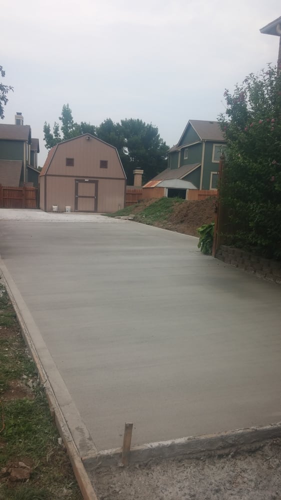 Long concrete driveway installation Kansas City — residential property | Ford Concrete