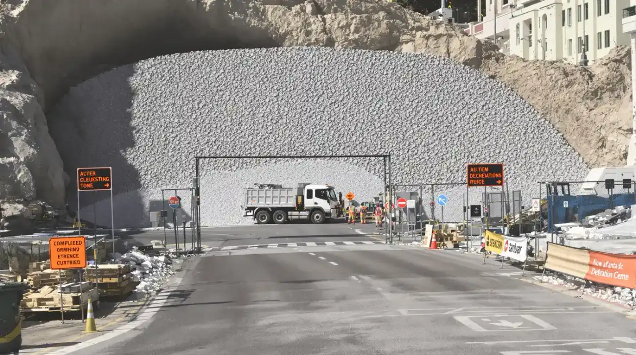 Stabilized construction entrance rock pad with crushed stone at a Kansas City commercial construction site