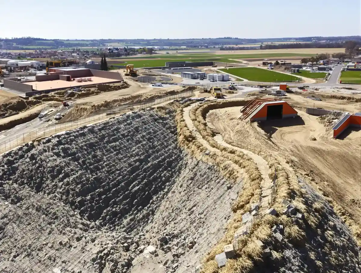 Silt fence, straw wattles, and construction entrance rock pad installed on a Kansas City construction site