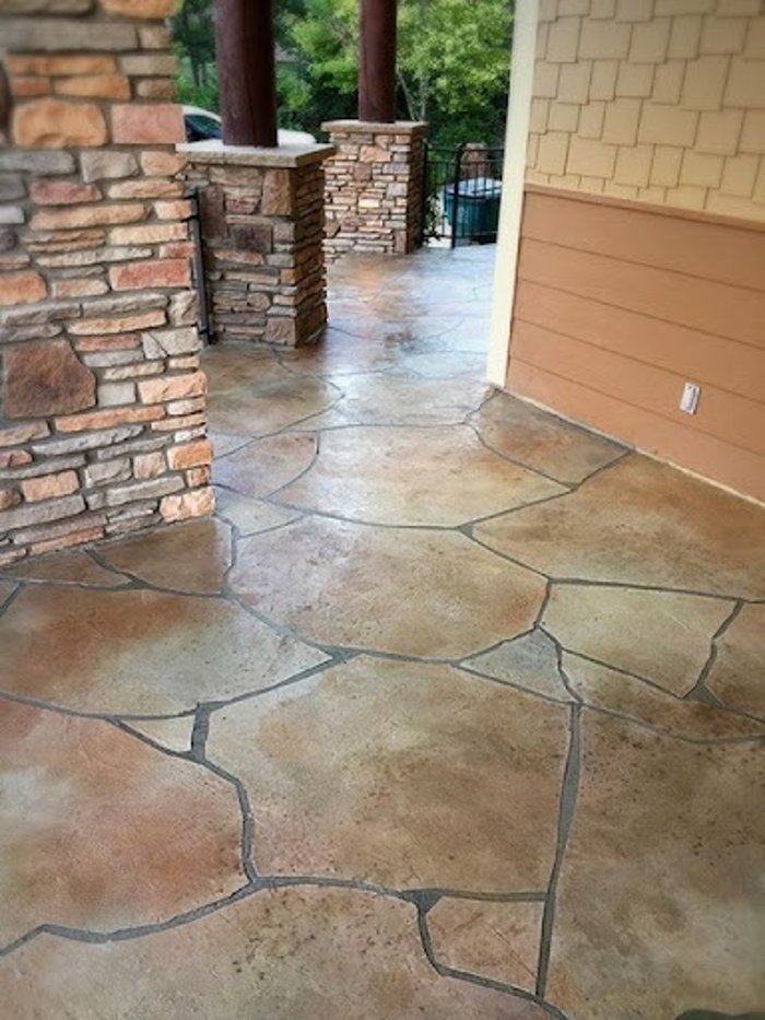 Stained concrete porch Kansas City — flagstone pattern overlay | Ford Concrete
