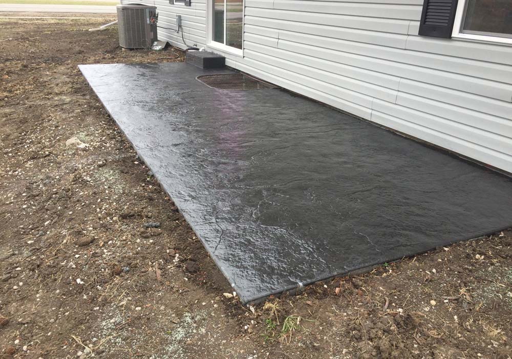 Stamped concrete patio contractor Kansas City — decorative pattern | Ford Concrete
